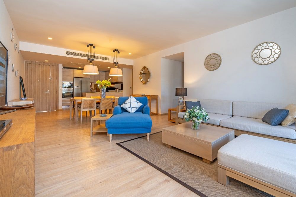 interior-design-villa-house-home-condo-apartment-feature-living-room-with-television-middle-table-cushion-open-space-kitchen-dining-room-min.jpg